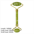 Green double-ended facial roller with gold-colored frame and dimension labels.