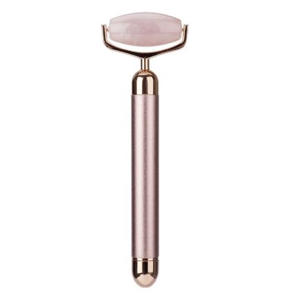 Rose gold electric facial roller with a faceted pink stone head.