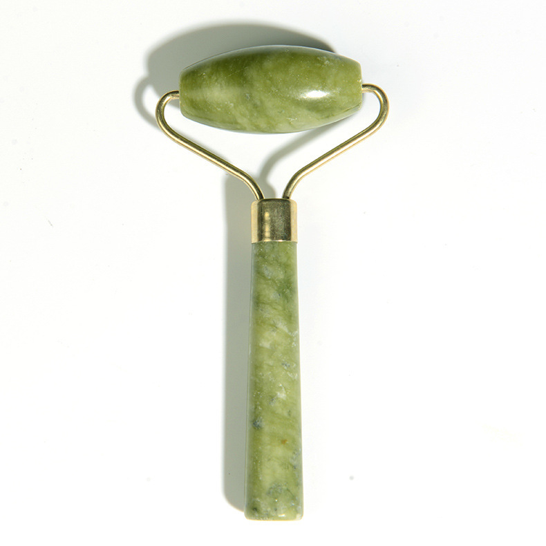 Single-ended green facial roller with a smooth oval head.