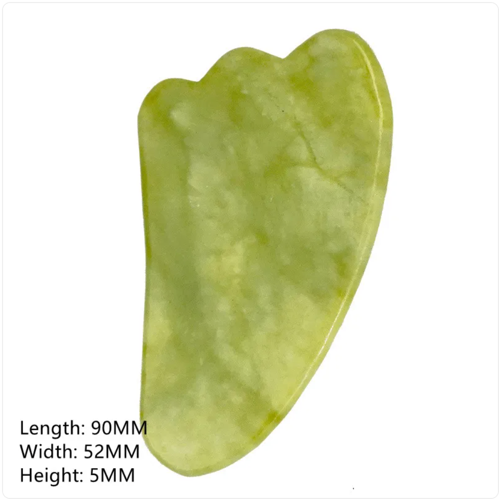 Long contoured green gua sha tool with measurements.