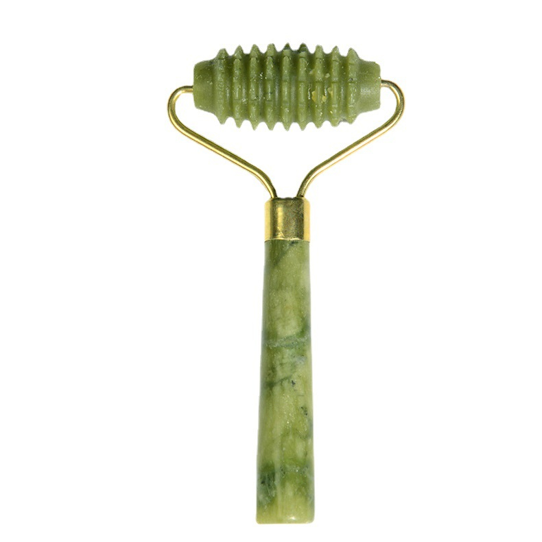 Single-ended green jade massage roller with a ridged head.