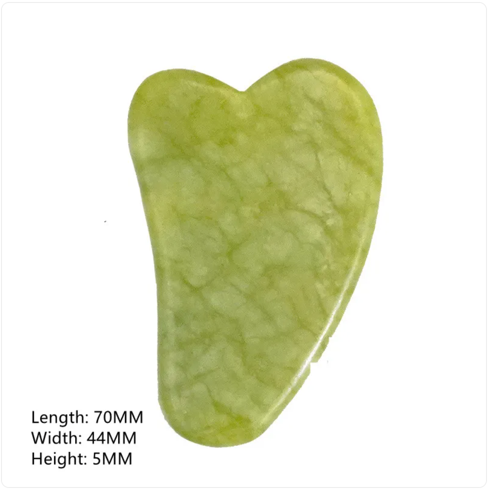 Small green heart-shaped gua sha tool with 70 × 44 × 5 mm dimensions.